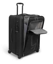 Load image into Gallery viewer, Angled front view of the suitcase with the front pocket and panel&#39;s unzipped. 
