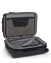 Load image into Gallery viewer, Interior view of the suitcase. It features a panel divider and adjustable straps.

