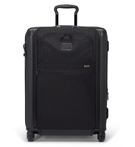 Front panel view of the black soft side suitcase on a white background. 