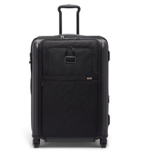 Load image into Gallery viewer, Front panel view of the black suitcase with the telescopic handle extended. 
