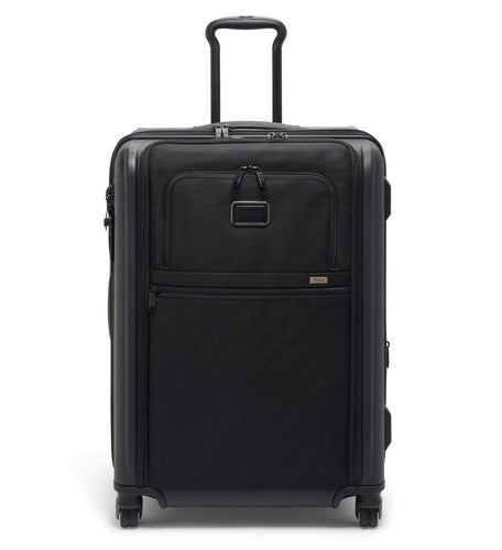 Front panel view of the black suitcase with the telescopic handle extended. 