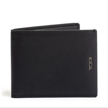 Load image into Gallery viewer, A black textured leather wallet with a flip design, featuring the Tumi logo on the bottom right corner.
