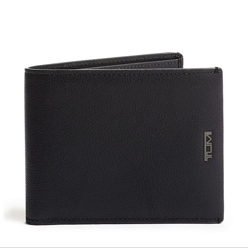 A black textured leather wallet with a flip design, featuring the Tumi logo on the bottom right corner.