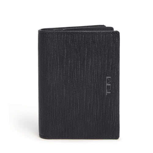 Front panel view of the wallet. A small Tumi logo is embossed on the side. 