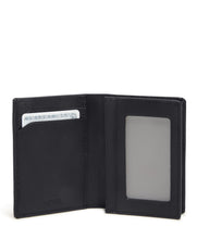 Load image into Gallery viewer, Interior view of the wallet. The right side has a windowed slide compartment for your ID, and the left side two card compartments. 
