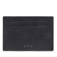Load image into Gallery viewer, Front panel view of the card case. A small Tumi logo is placed at the bottom center. 
