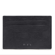 Front panel view of the card case. A small Tumi logo is placed at the bottom center. 
