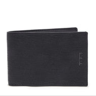 Front panel view of the black wallet. a small Tumi logo is embossed on the side. 