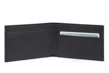 Load image into Gallery viewer, Unfolded view of the wallet. 
