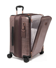 Load image into Gallery viewer, Angled front panel view of the suitcase with the front pocket unzipped. 

