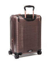 Load image into Gallery viewer, Angled back panel view of the suitcase. 
