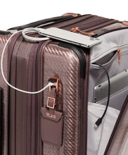 Load image into Gallery viewer, Close up to the side panel, featuring the USB plug above the tag. You can charge your mobile devices with the use of a battery bank. (Bank not included). 
