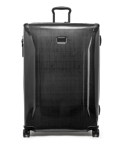 A black 4-wheeled expandable packing case with a telescoping handle, spinner wheels, and a retractable grab handle.