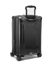 Load image into Gallery viewer, Angled back panel view of the suitcase with the telescopic handle partly extended. 
