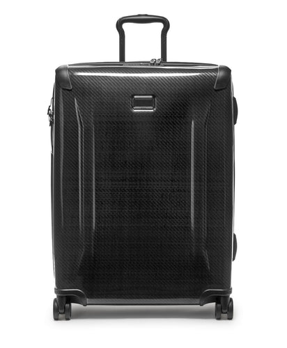 Front panel view of the suitcase with the telescopic handle partly extended. 