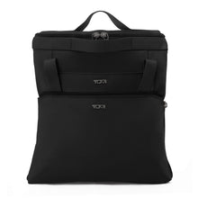 Load image into Gallery viewer, The duffle bag shown folded for easy storage. 
