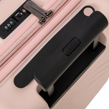 Load image into Gallery viewer, Close up to the top of the suitcase. The three-number combination lock is at the center. 
