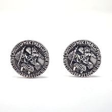 Load image into Gallery viewer, Front view of the two circular shaped silver cufflinks. The engraved circled text reads: BEHOLD SAINT CHRISTOPHER THEN GO YOUR WAY IN SAFETY.
