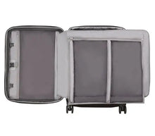 Load image into Gallery viewer, Interior view of the suitcase showing the foldable compartment for garments and zipper-closing compartments in the front panel.
