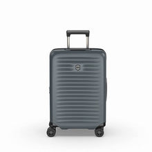 Load image into Gallery viewer, Front panel view of the suitcase with the telescopic handle partially extended. 
