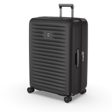 Load image into Gallery viewer, Angled front view of the hard shell suitcase. 
