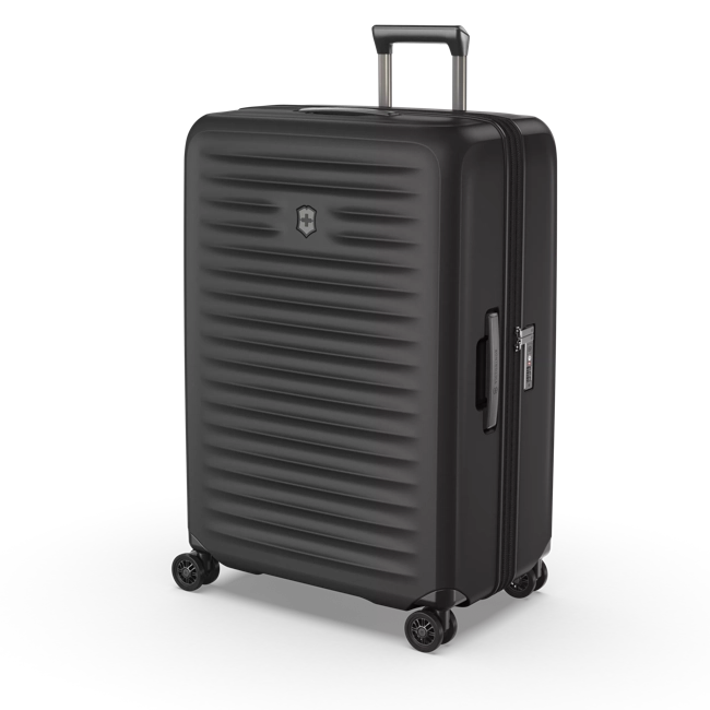 Angled front view of the hard shell suitcase. 