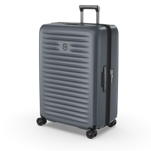 Load image into Gallery viewer, Angled front view of the large case in storm gray. 
