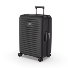 Load image into Gallery viewer, Angled front view of the hard shell suitcase. 
