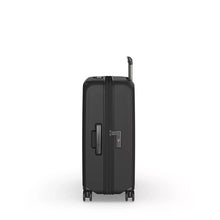 Load image into Gallery viewer, Side panel view of the black hard shell suitcase. It features a handle and a TSA approved 3-digit combination lock. 
