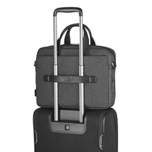 Load image into Gallery viewer, The briefcase&#39;s back strap passed through the telescopic handle of a suitcase to secure it.
