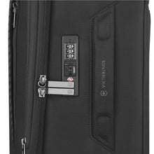 Load image into Gallery viewer, Close up to the TSA-approved three digit combination lock and handle on the side panel. 
