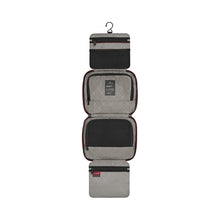 Load image into Gallery viewer, The Toiletry Bag Extended in Hanging Position, showing the compartments. 
