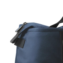Load image into Gallery viewer, Close up to the blue duffle bag&#39;s main compartment zipper. 
