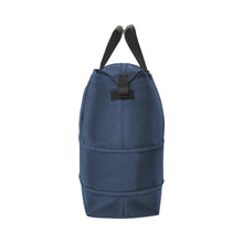 Load image into Gallery viewer, Side panel view of the blue duffle bag with the expandable feature extended.
