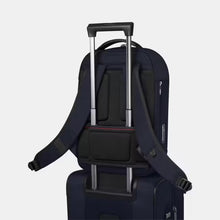 Load image into Gallery viewer, Angled back panel view of the backpack with the attachment straps holding it to the telescopic handle of a suitcase. 
