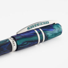 Load image into Gallery viewer, Close up to the cap clip of the The Visconti Homo Sapiens Earth Origins Fountain Pen. The word VISCONTI is engraved on both sides of the clip.
