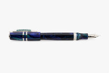 Load image into Gallery viewer, The Visconti Homo Sapiens Earth Origins Fountain Pen laid on a white background with the cap posted. 
