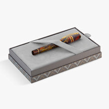 Load image into Gallery viewer, The capped rollerball pen presented inside a gray presentation box.
