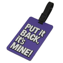 Load image into Gallery viewer, Angled Front view of the purple luggage tag with white text and a black strap. It reads: Put it BACK, it&#39;s MINE!
