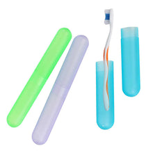 Load image into Gallery viewer, View of the green, purple, and blue included tooth brush cases. 
