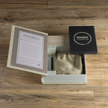 Load image into Gallery viewer, Interior view of the packaging with the contents arranged inside and outside.
