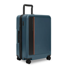 Load image into Gallery viewer, Angled view of the Ocean Blue Suitcase with the telescopic handle pulled up. 
