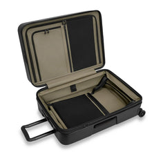 Load image into Gallery viewer, Angled view of the black suitcase with the main compartment opened.
