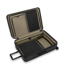 Load image into Gallery viewer, Angled view of the black suitcase with the main compartment unzipped and opened. 
