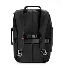Load image into Gallery viewer, Back panel view of the black backpack duffel. It features adjustable shoulder straps, padded back, and a sternum strap.
