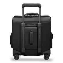 Load image into Gallery viewer, Back panel view of the black underseat cabin spinner. It features an attachment feature which can be retracted between the grip handle rails. 
