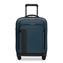 Load image into Gallery viewer, Front view of the ocean blue spinner suitcase with the telescopic handle part way lifted. 
