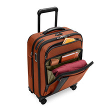 Load image into Gallery viewer, full angled view of the front compartments open of the canyon Briggs &amp; Riley Global 21" Carry-on Expandable Spinner
