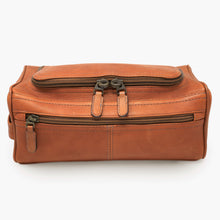 Load image into Gallery viewer, tan leather toiletry bag with multiple compartments and dark metal zippers
