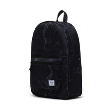 Load image into Gallery viewer, Angled front view of the black marble backpack.
